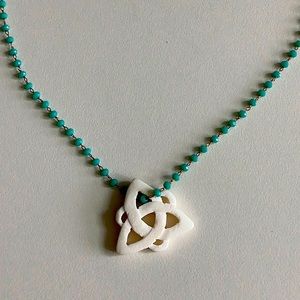 Turquoise and carved detail necklace